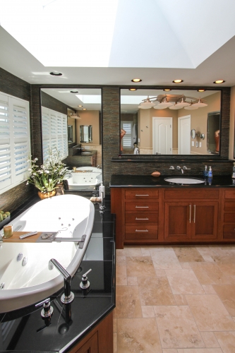 Bathroom Master Suite Masculine wood vanity black granite jacuzzi tub