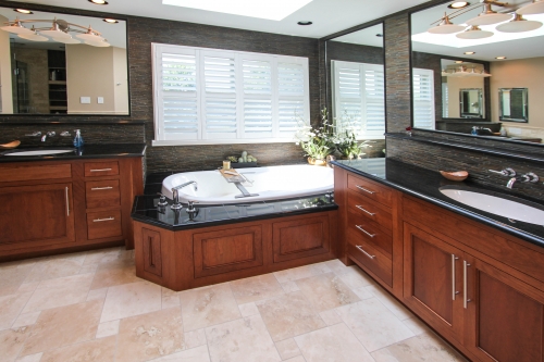 Bathroom Master Suite black granite wood vanity skylight light floor tile earthy