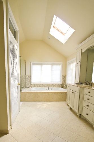 Master Bath Cream Cabinetry Beige Natural Stone Countertop Double Vanity Skylight