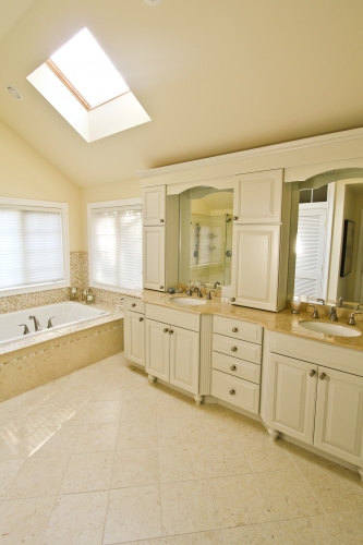 Master Bath Skylight Jacuzzi Tub Beige Tones Cream Cabinetry