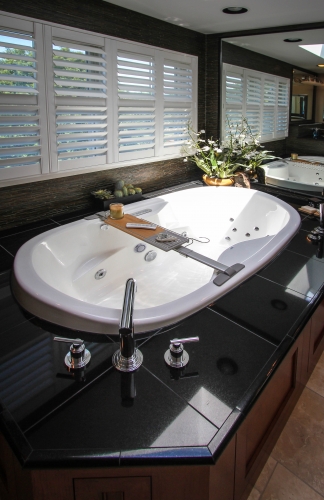 Master Bathroom Dropin Jacuzzi Tub black granite chrome spa