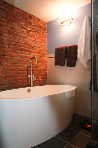 Master Bathroom Modern Soaking Tub exposed brick freestanding industrial  (1)