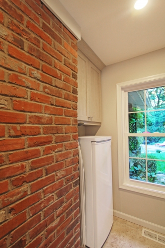 Transitional Laundry Room Exposed Brick Gray Cabinetry (1)