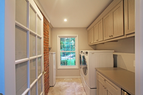 Transitional Laundry Room Exposed Brick Gray Cabinetry