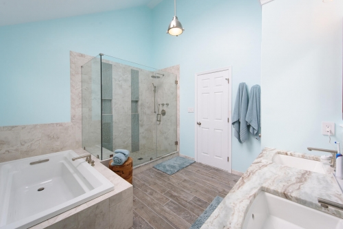 Transitional Master Bath Teal Wall Paint Wood Look Tile Handheld Shower Mosaic Floor Jacuzzi Tub Frameless Glass Enclosure