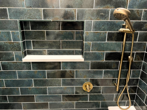  green subway tile shower niche shelf gold fixtures dRemodeling