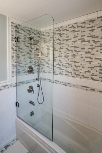 bathroom remodel compact tub glass panel frameless transitional teal handheld satin nickel white subway tile black vanity aqua linear tiles 0664