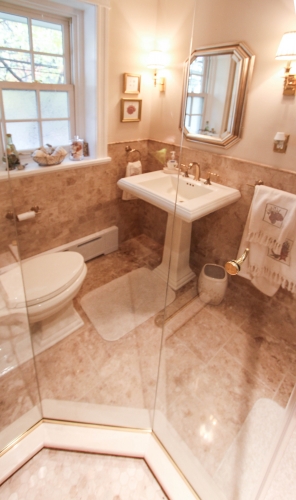 bathroom walkin shower gold warm traditional glass enclosure mosaic floor bench beige hexagon marble 