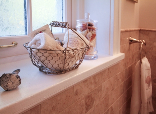 bathroom walkin shower gold warm traditional glass enclosure mosaic floor bench beige wire basket