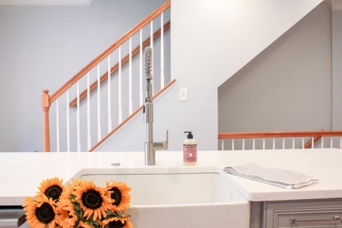 bright transitional kitchen apron sink sunflowers