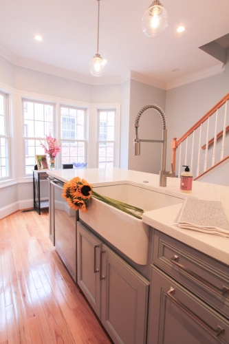 bright transitional kitchen gray island