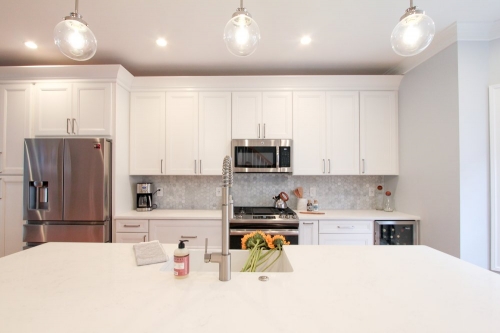 bright transitional kitchen white shaker cabinetry