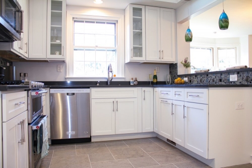 casual white shaker kitchen gray porcelain flooring