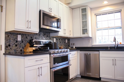 casual white shaker kitchen stainless appliances