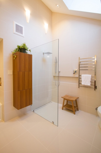 master bath remodel large format tile curbless towel warmer skylight