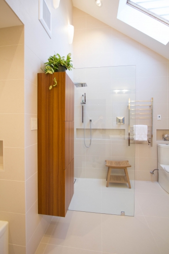 master bath remodel large format tile curbless towel warmer skylight linen closet