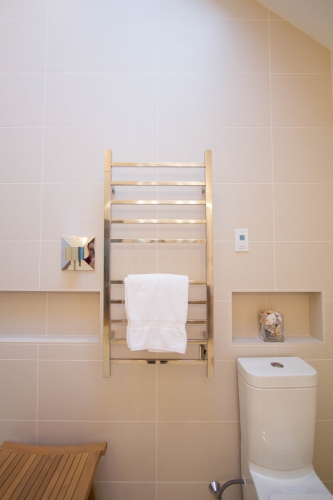 master bath remodel recessed niche towel warmer curbless shower beige modern