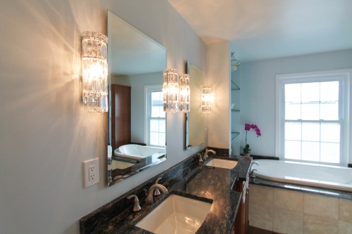 master bathroom remodel granite hardwood dark blue varied chandelier builtin shelving glass full height(6)