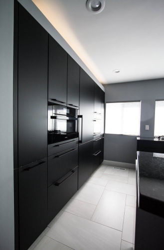 modern monochrome kitchen black slab cabinetry