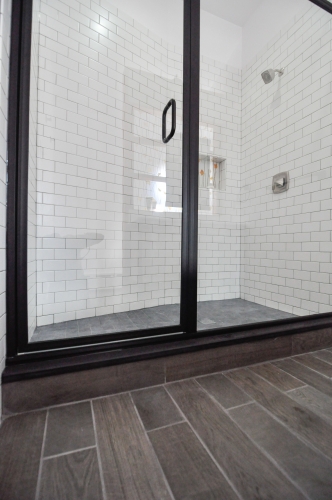 modern industrial bath subway tile recessed storage niche black mosaic shower floor tile 