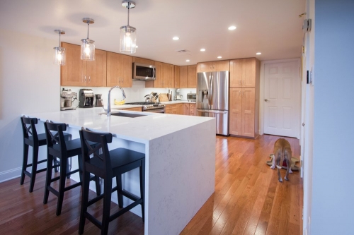 natural wood transitional kitchen waterfall countertop