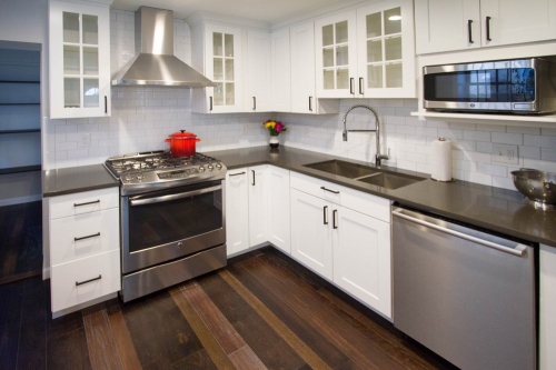 transitional kitchen glass mullion upper cabinets