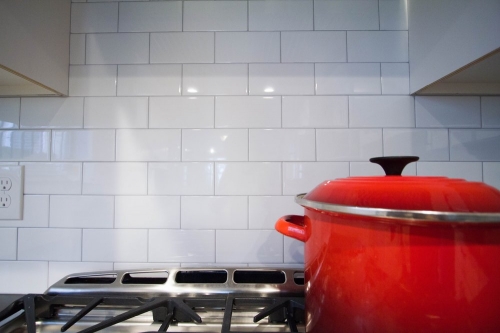 transitional kitchen white subway backsplash