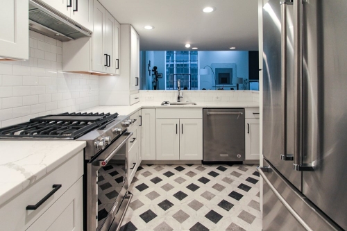 white basement kitchen gas range