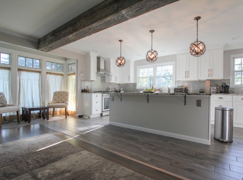 white kitchen reclaimed support beam