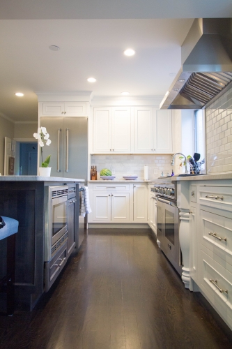 white traditional kitchen remodel dark stained floors